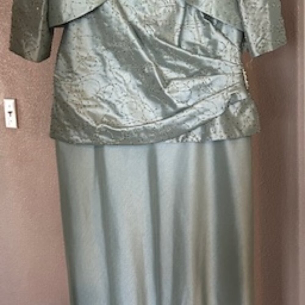 Full length dress with ruched styling with balero jacket.